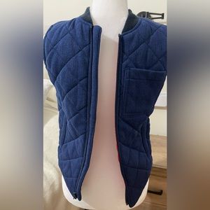 Old navy, Navy blue quilted boys vest size M with red lining.